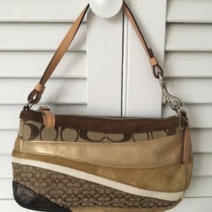 Coach Handbag.  Can also be used as a wristlet.